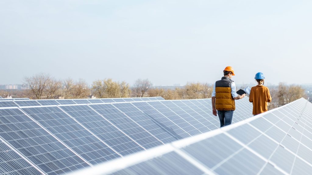 engineers on a solar power plant